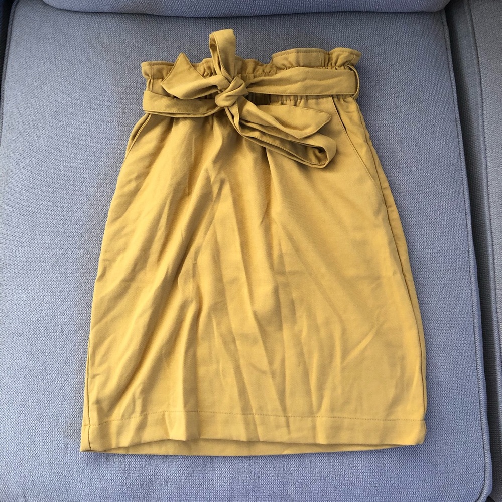 Paper bag skirt.